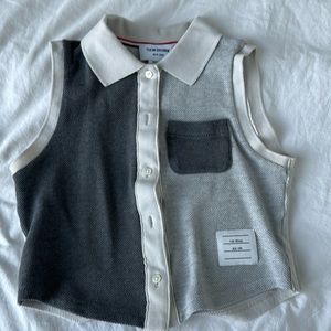 Thom Browne vest top. Very chic grey with breast pocket. Pair with short skirt